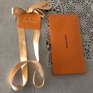 Louis Vuitton gift receipt with bow